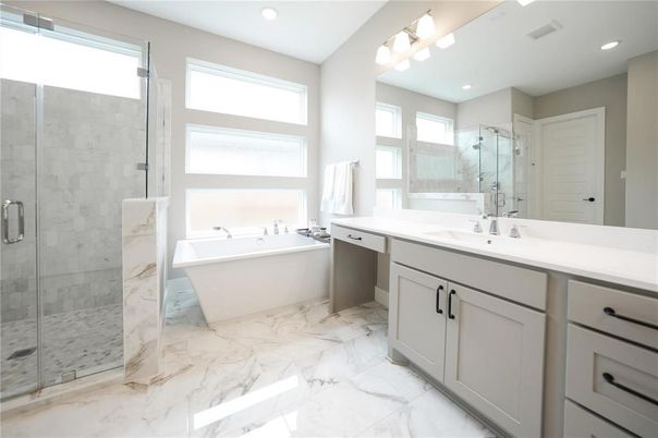 Bathroom, Dual Sink Vanities, Free Standing Baths, Glass Shower, Interior, Marble, Marble Walls, Recessed Lighting