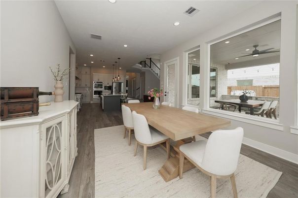 Dining room, Interior, Kitchen, Pendant Lights, Recessed Lighting, Stainless Steel Appliances, Wood Texture Flooring