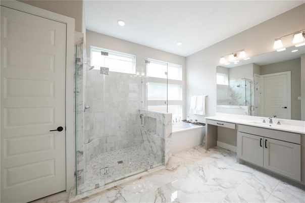 Bathroom, Dual Sink Vanities, Glass Shower, Interior, Marble, Marble Walls, Recessed Lighting