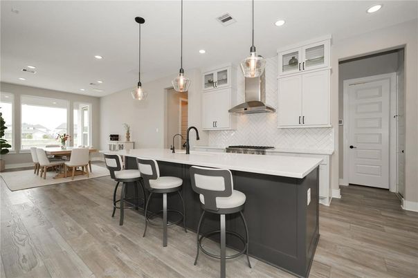 Dining room, Interior, Kitchen, Pendant Lights, Recessed Lighting, Stainless Steel Appliances, Wood Texture Flooring