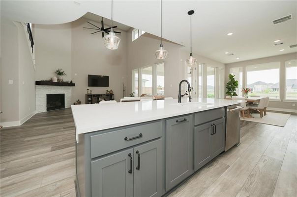 Dining room, Fireplace, Interior, Kitchen, Pendant Lights, Recessed Lighting, Wood Texture Flooring
