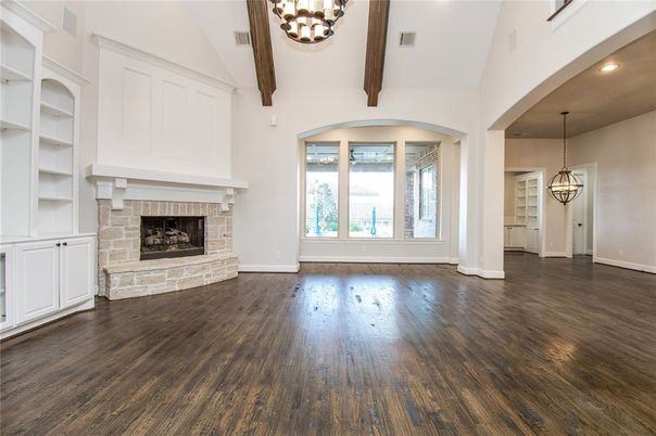 Empty room, Fireplace, Interior, Pendant Lights, Recessed Lighting, Wooden Beams, Wood Texture Flooring