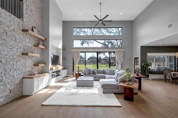 Dining room, Fireplace, Interior, Living room, Pendant Lights, Recessed Lighting, Stone Walls, Wood Texture Flooring