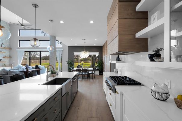Dining room, Interior, Kitchen, Pendant Lights, Recessed Lighting, Stainless Steel Appliances, Wood Texture Flooring