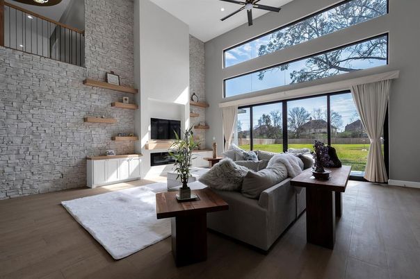 Fireplace, Interior, Living room, Recessed Lighting, Stone Walls, Wood Texture Flooring