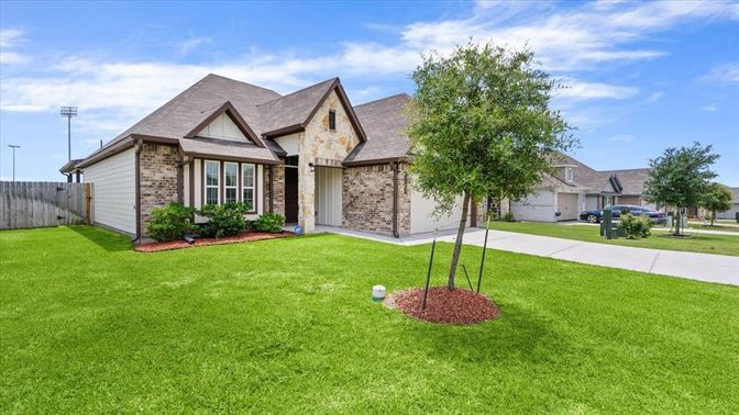 Attached, Backyard, Exterior, Facade, Brick Facade, Brick Traditional