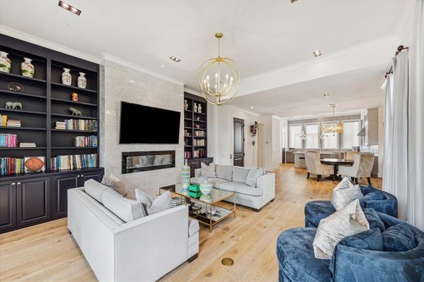Chandelier, Dining room, Fireplace, Interior, Living room, Pendant Lights, Recessed Lighting, Wood Texture Flooring