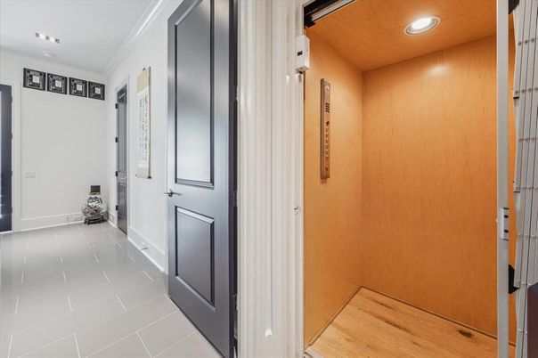 Elevator, Interior, Recessed Lighting, Wood Texture Flooring, Wooden Walls