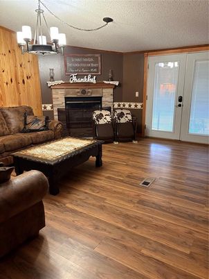 Chandelier, Fireplace, Interior, Living room, Wood Texture Flooring