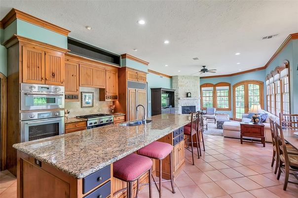 Dining room, Fireplace, Interior, Kitchen, Living room, Recessed Lighting, Stainless Steel Appliances