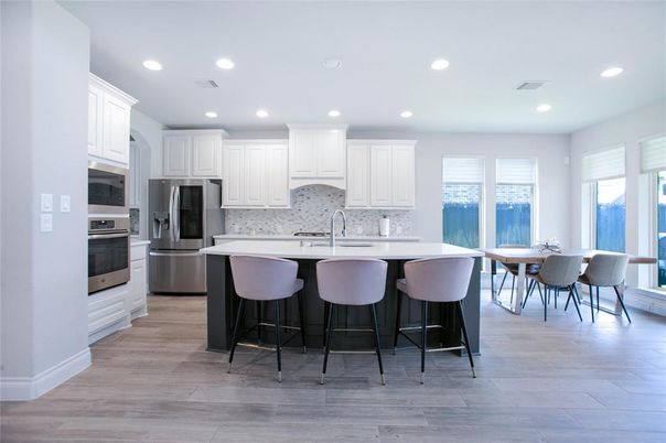 Dining room, Interior, Kitchen, Recessed Lighting, Stainless Steel Appliances, Wood Texture Flooring