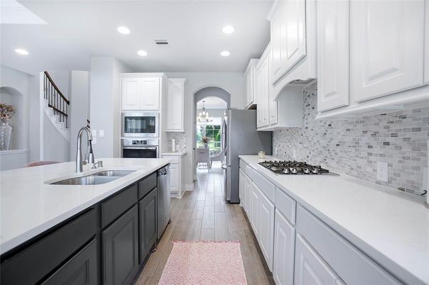 Chandelier, Interior, Kitchen, Recessed Lighting, Stainless Steel Appliances, Wood Texture Flooring
