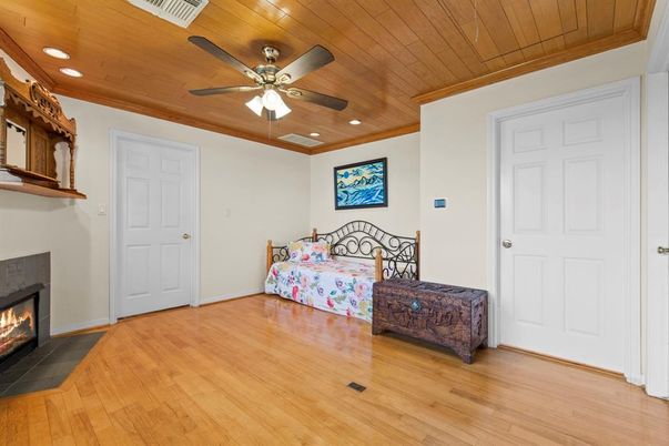 Bedroom, Fireplace, Interior, Recessed Lighting, Wooden Ceilings, Wood Texture Flooring