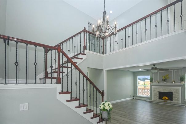 Chandelier, Fireplace, Interior, Recessed Lighting, Wood Texture Flooring