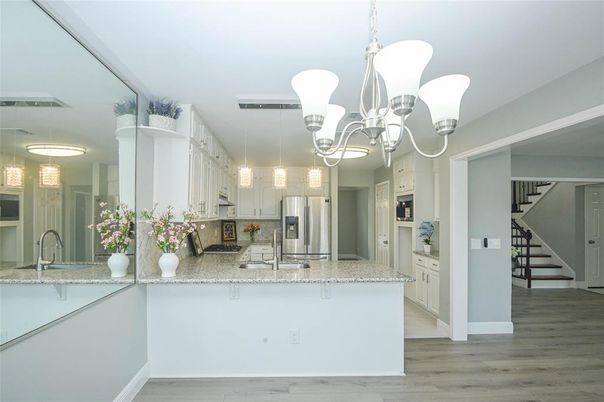 Chandelier, Interior, Kitchen, Pendant Lights, Stainless Steel Appliances, Wood Texture Flooring