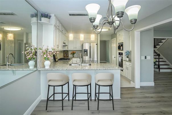 Chandelier, Interior, Kitchen, Pendant Lights, Stainless Steel Appliances, Wood Texture Flooring