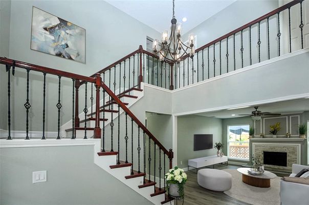 Chandelier, Fireplace, Interior, Living room, Recessed Lighting, Wood Texture Flooring