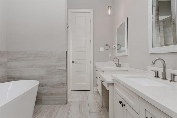 Bathroom, Dual Sink Vanities, Free Standing Baths, Interior, Pendant Lights, Wood Texture Flooring
