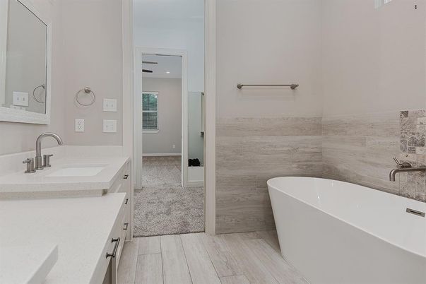 Bathroom, Dual Sink Vanities, Free Standing Baths, Interior, Recessed Lighting, Wood Texture Flooring