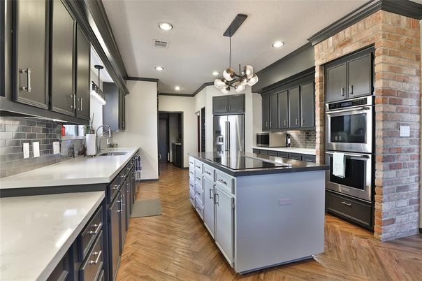 Interior, Kitchen, Pendant Lights, Recessed Lighting, Stainless Steel Appliances, Stone Walls, Wood Texture Flooring