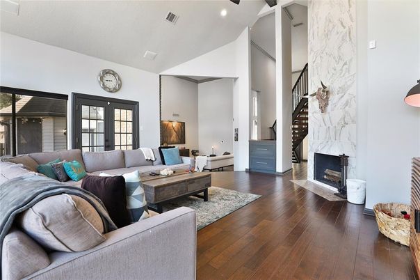 Fireplace, Interior, Living room, Marble Walls, Recessed Lighting, Wood Texture Flooring