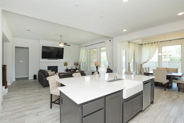 Dining room, Fireplace, Interior, Kitchen, Recessed Lighting, Wood Texture Flooring