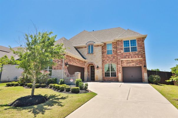 Attached, Backyard, Exterior, Facade, Brick Facade, Brick Traditional