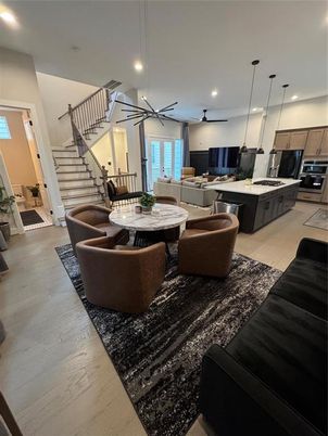 Dining room, Interior, Kitchen, Living room, Pendant Lights, Recessed Lighting, Stainless Steel Appliances, Wood Texture Flooring