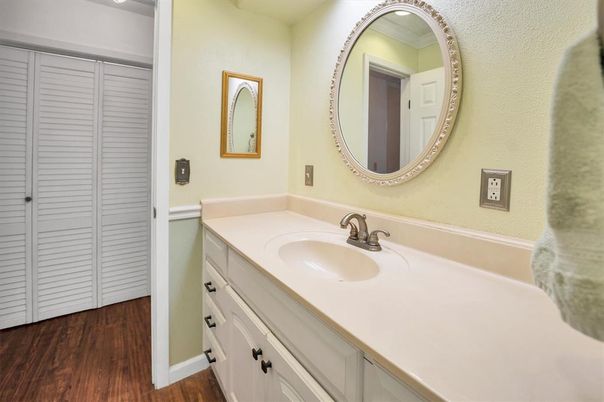 Bathroom, Dual Sink Vanities, Interior, Recessed Lighting, Wood Texture Flooring