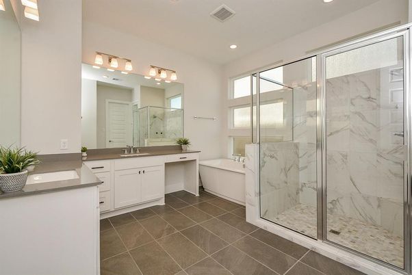 Bathroom, Dual Sink Vanities, Glass Shower, Interior, Marble Walls, Recessed Lighting