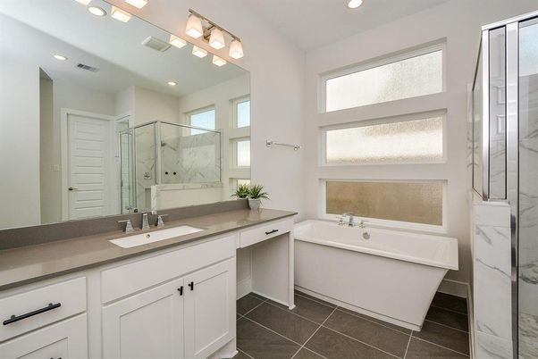 Bathroom, Dual Sink Vanities, Free Standing Baths, Glass Shower, Interior, Marble Walls, Recessed Lighting