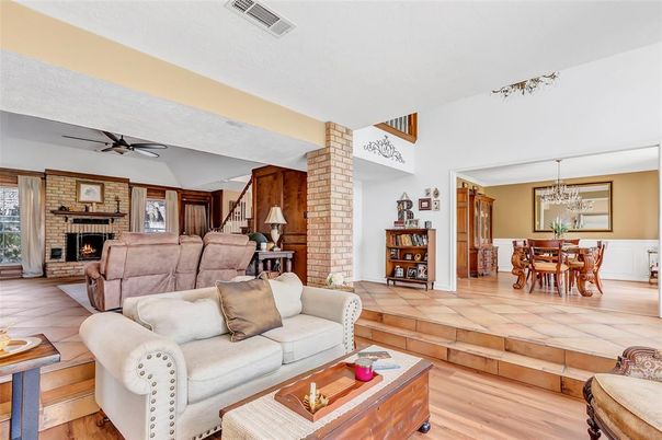 Dining room, Fireplace, Interior, Living room, Pendant Lights, Stone Walls, Wood Texture Flooring