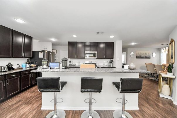Dining room, Interior, Kitchen, Recessed Lighting, Stainless Steel Appliances, Wood Texture Flooring