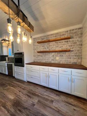 Interior, Kitchen, Pendant Lights, Stainless Steel Appliances, Stone Walls, Wooden Beams, Wood Texture Flooring
