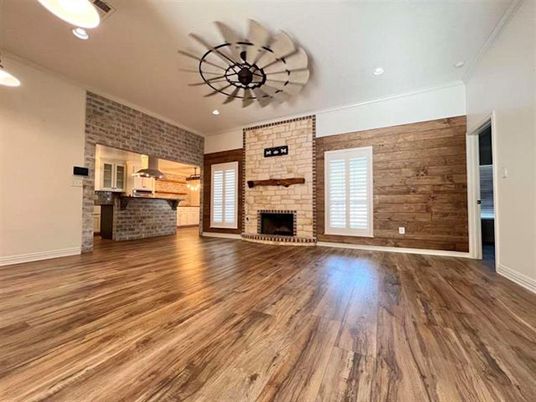 Empty room, Fireplace, Interior, Kitchen, Recessed Lighting, Stone Walls, Wood Texture Flooring, Wooden Walls