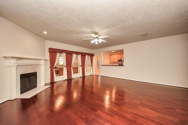Empty room, Fireplace, Interior, Recessed Lighting, Wood Texture Flooring