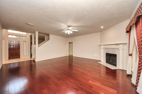 Empty room, Fireplace, Interior, Recessed Lighting, Wood Texture Flooring