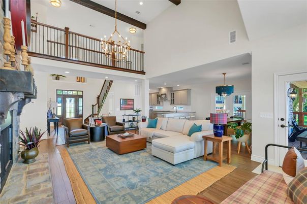 Chandelier, Fireplace, Interior, Living room, Pendant Lights, Recessed Lighting, Wooden Beams, Wood Texture Flooring