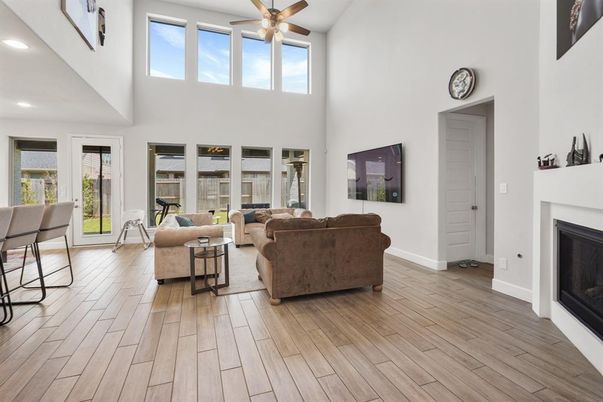 Fireplace, Interior, Living room, Recessed Lighting, Wood Texture Flooring