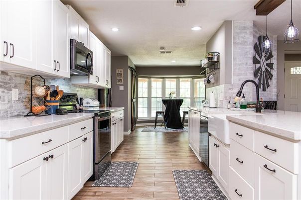 Dining room, Interior, Kitchen, Pendant Lights, Recessed Lighting, Stainless Steel Appliances, Wood Texture Flooring