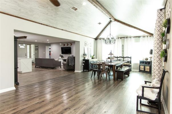 Chandelier, Dining room, Interior, Living room, Pendant Lights, Recessed Lighting, Stone Walls, Wood Texture Flooring