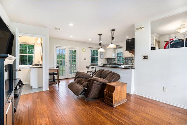 Fireplace, Interior, Kitchen, Pendant Lights, Recessed Lighting, Stainless Steel Appliances, Wood Texture Flooring