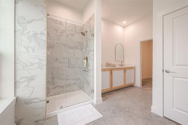 Bathroom, Dual Sink Vanities, Glass Shower, Interior, Marble Walls, Recessed Lighting