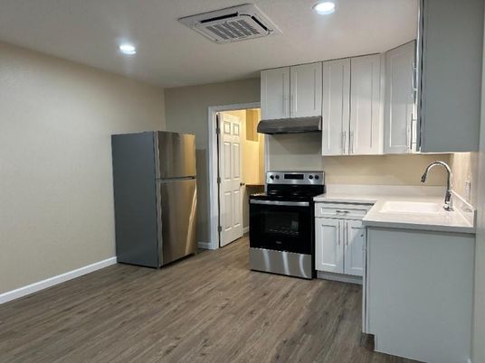 Interior, Kitchen, Recessed Lighting, Stainless Steel Appliances, Wood Texture Flooring