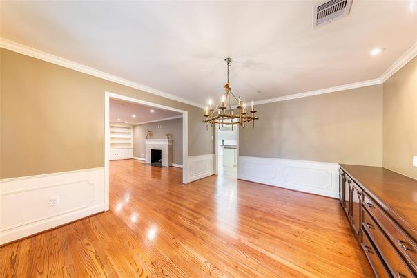 Chandelier, Empty room, Fireplace, Interior, Pendant Lights, Recessed Lighting, Wood Texture Flooring