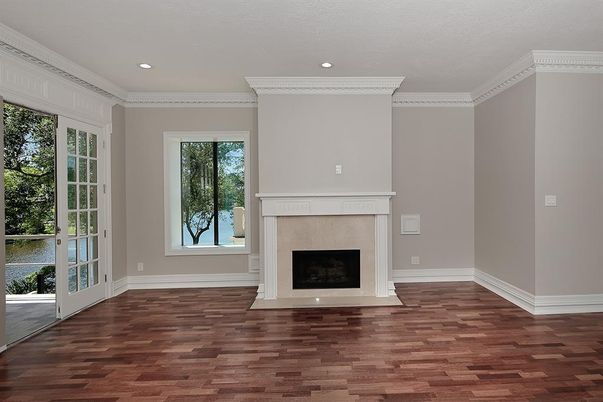 Empty room, Fireplace, Interior, Recessed Lighting, Water, Wood Texture Flooring