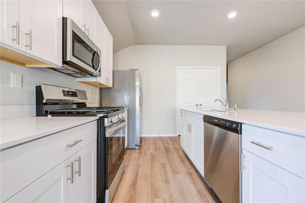 Interior, Kitchen, Recessed Lighting, Stainless Steel Appliances, Wood Texture Flooring