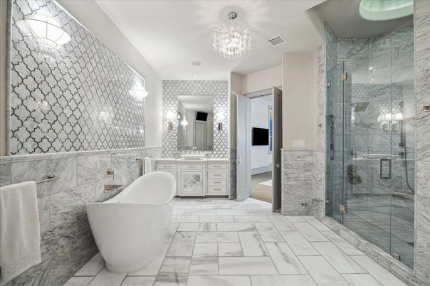 Bathroom, Chandelier, Free Standing Baths, Glass Shower, Interior, Marble, Marble Walls, Recessed Lighting