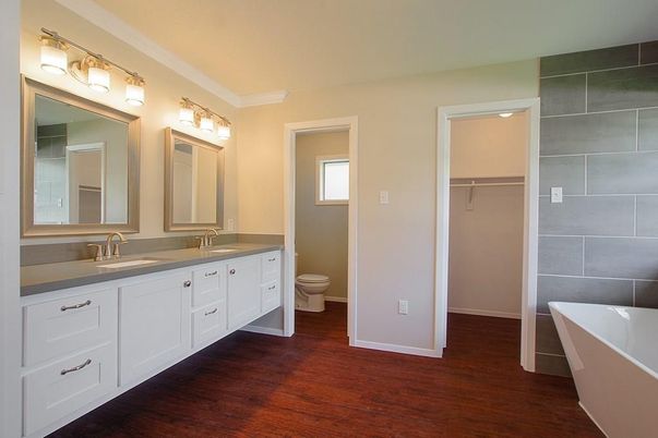 Bathroom, Dual Sink Vanities, Free Standing Baths, Interior, Walk-in Closets, Wood Texture Flooring