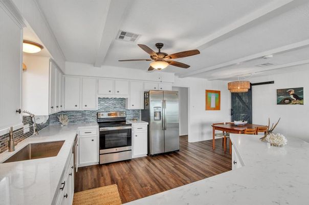 Dining room, Interior, Kitchen, Pendant Lights, Stainless Steel Appliances, Wood Texture Flooring